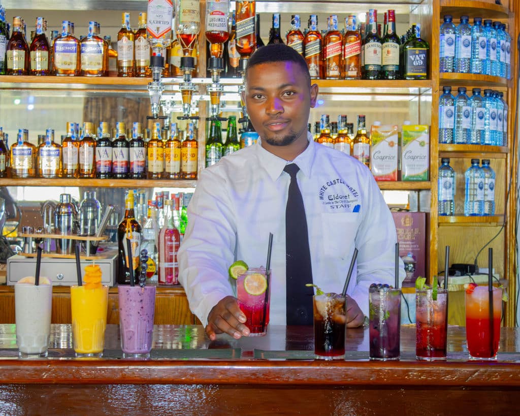 Bartender with cocktails