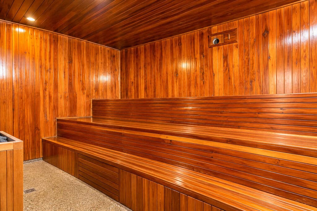 The timber-lined steam bath