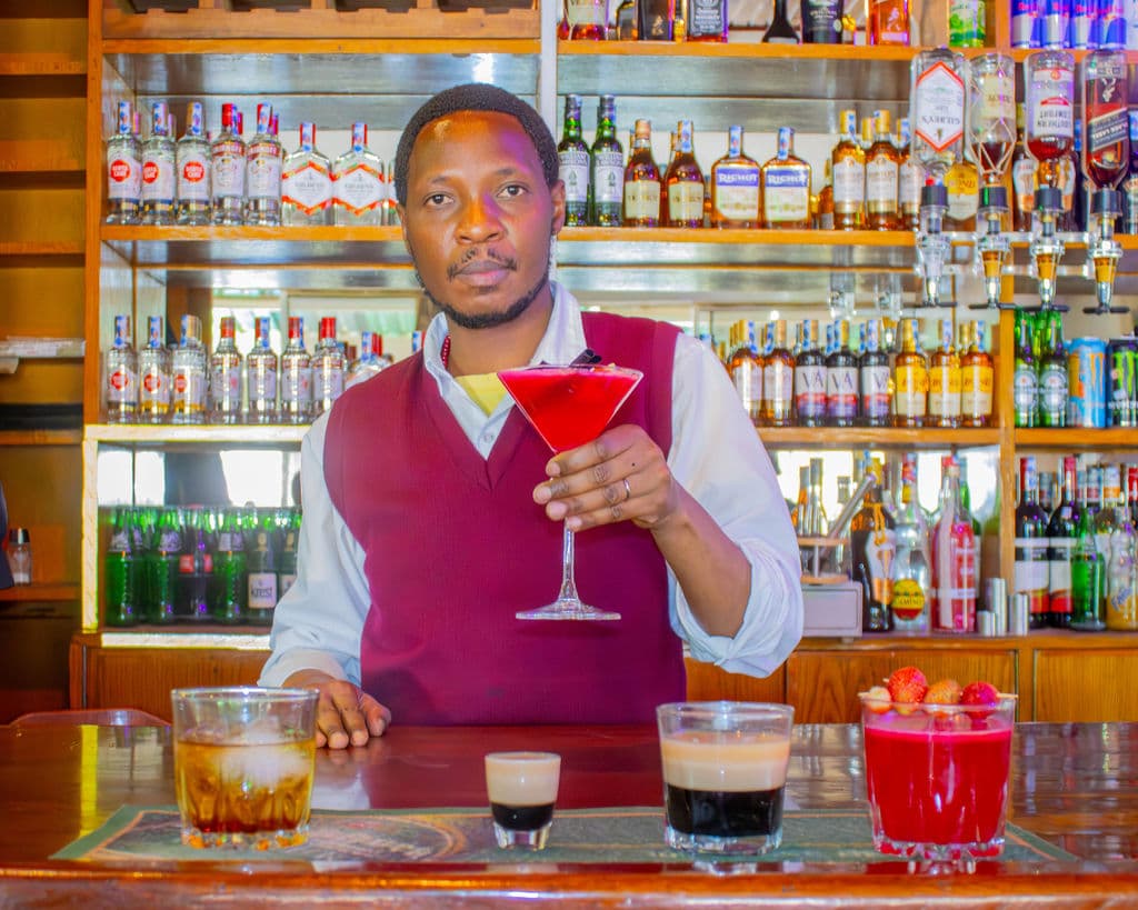 Bartender holding a cocktail