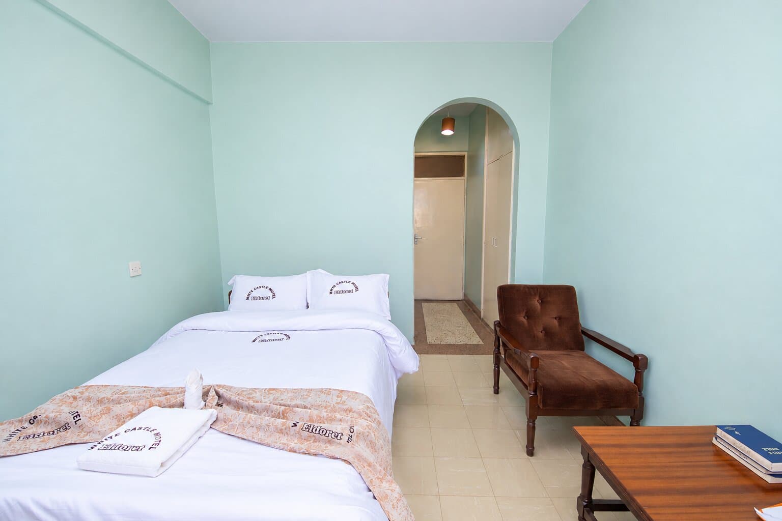 Single room with an armchair